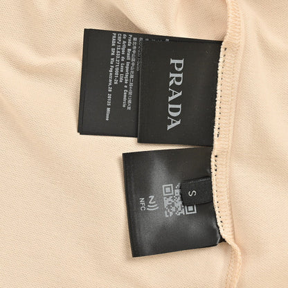 Polo beige à écusson logo Prada