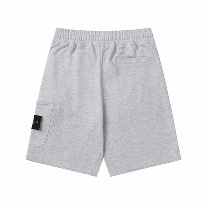Short à monogramme en pierre