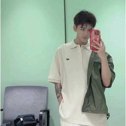 Polo beige à écusson logo Prada