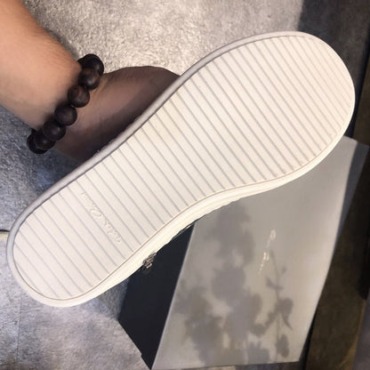 Baskets montantes en cuir vert métallisé