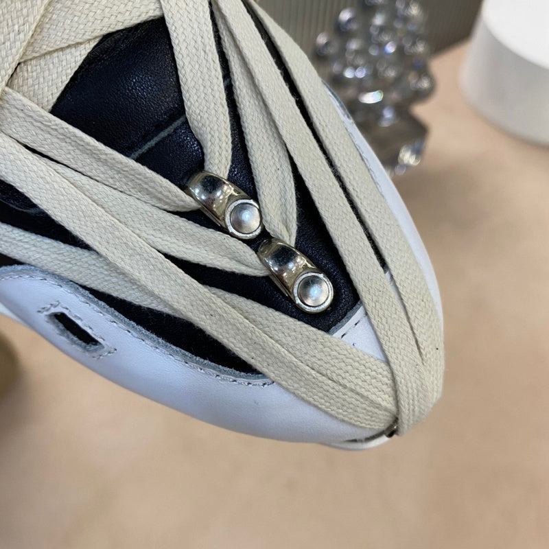 Baskets innovantes à lacets enroulés