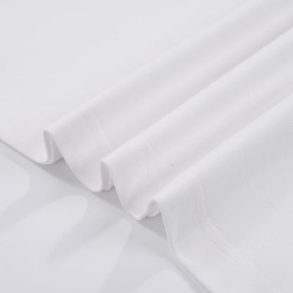 T-SHIRT BLANC À MOTIFS DE CŒURS CHROMÉS ET PAILLETTES