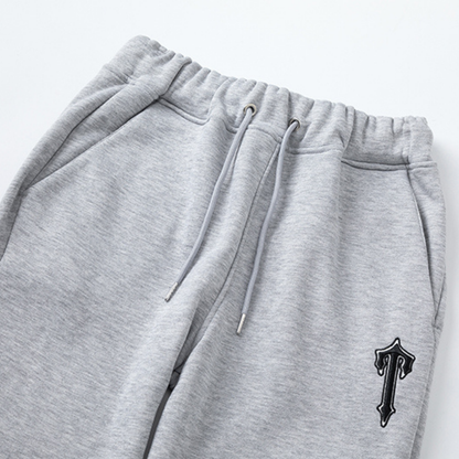 Survêtement bleu à capuche et rayures en V