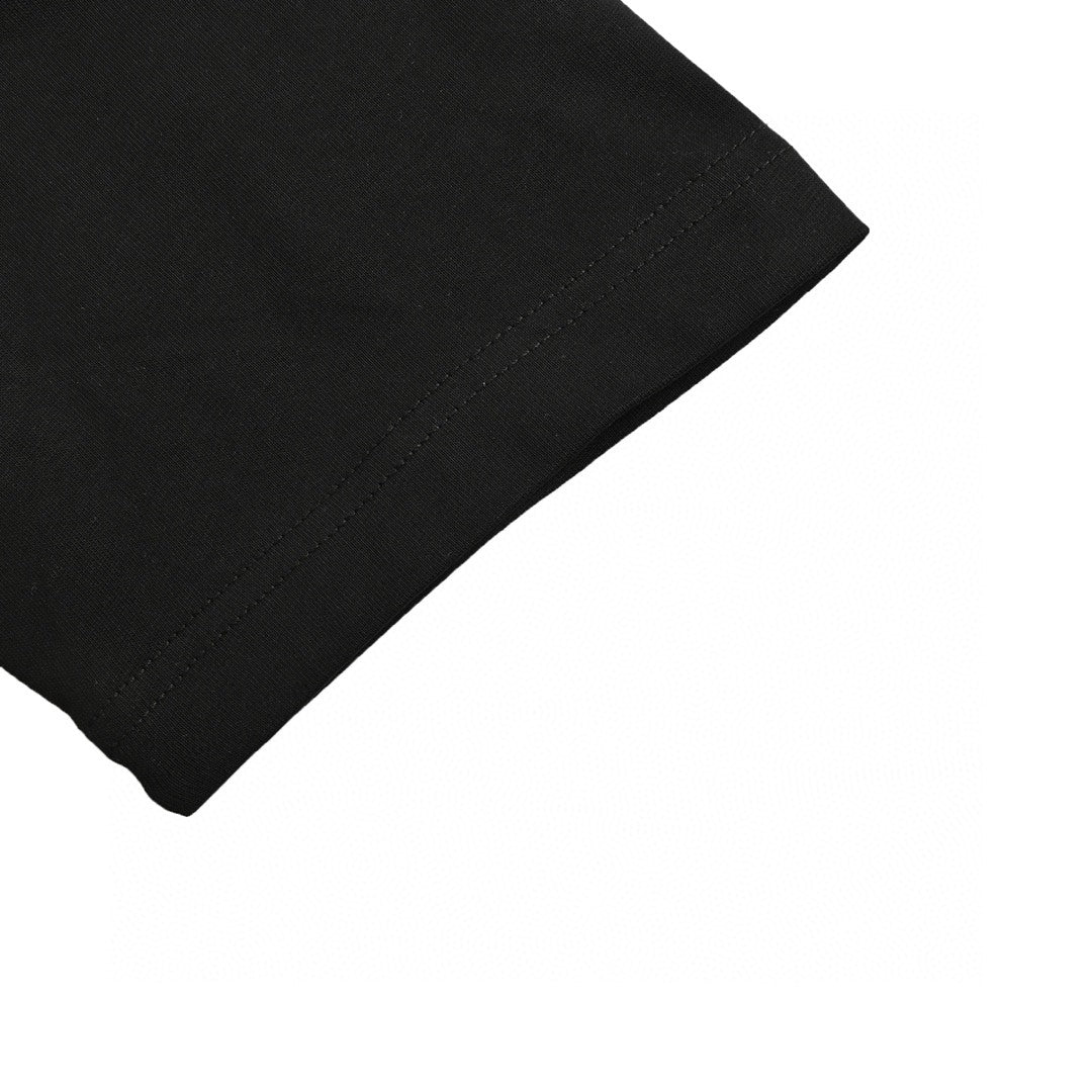 T-shirt noir Chanel à logo rose éclaboussé