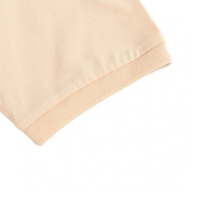 Polo beige à écusson logo Prada