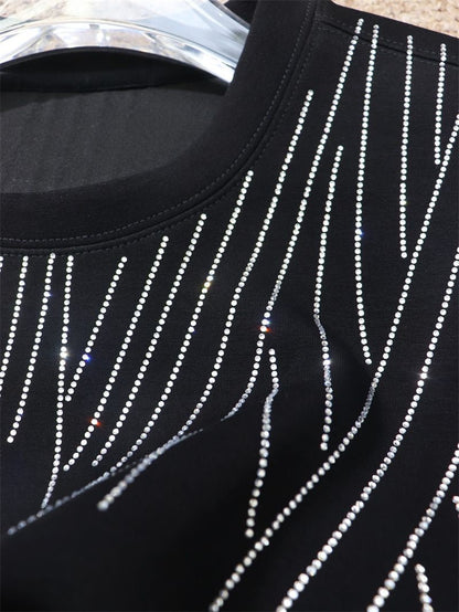 Sweat-shirt noir à motif cœurs chromés et strass