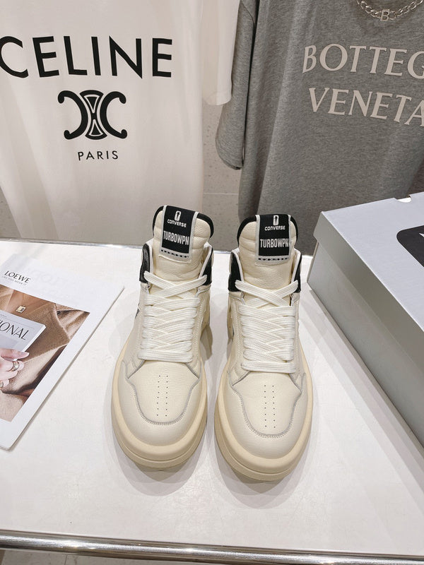 Baskets montantes Rick Owens crème et noires