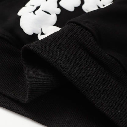 Sweat à capuche noir en coton avec motif de déchirures de denim et couronne
