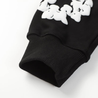 Sweat à capuche noir en coton avec motif de déchirures de denim et couronne