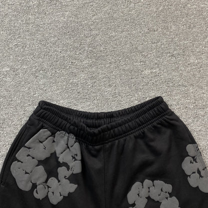 Short en coton à motif de déchirures en denim et couronne monochrome noir