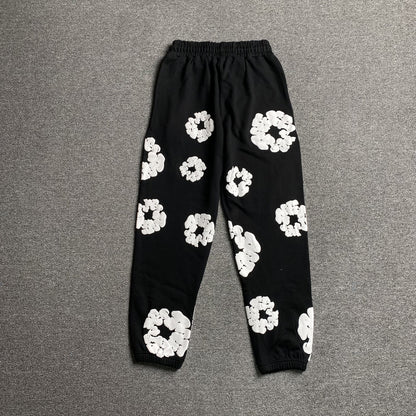 Pantalon de survêtement noir en coton déchiré et couronne