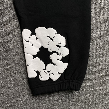 Pantalon de survêtement noir en coton déchiré et couronne