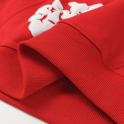 Sweat à capuche rouge en coton avec motif de déchirures de denim