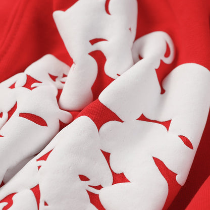 Sweat à capuche rouge en coton avec motif de déchirures de denim