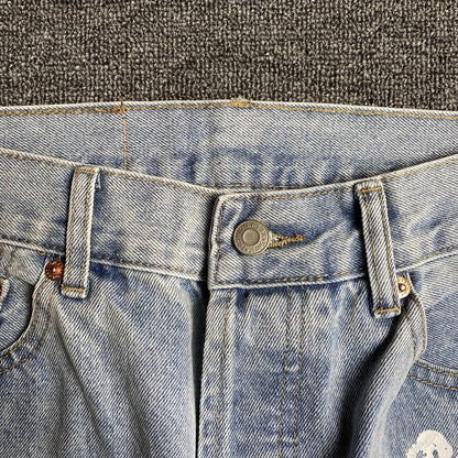 DENIM TEARS x LEVI'S COTTON WREATH JEANS DÉLAVAGE LÉGER