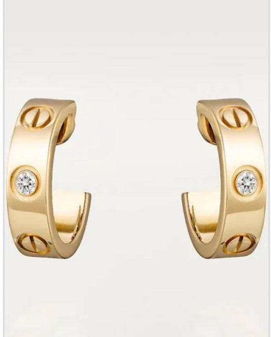 Cartier small earrings gold diamonds