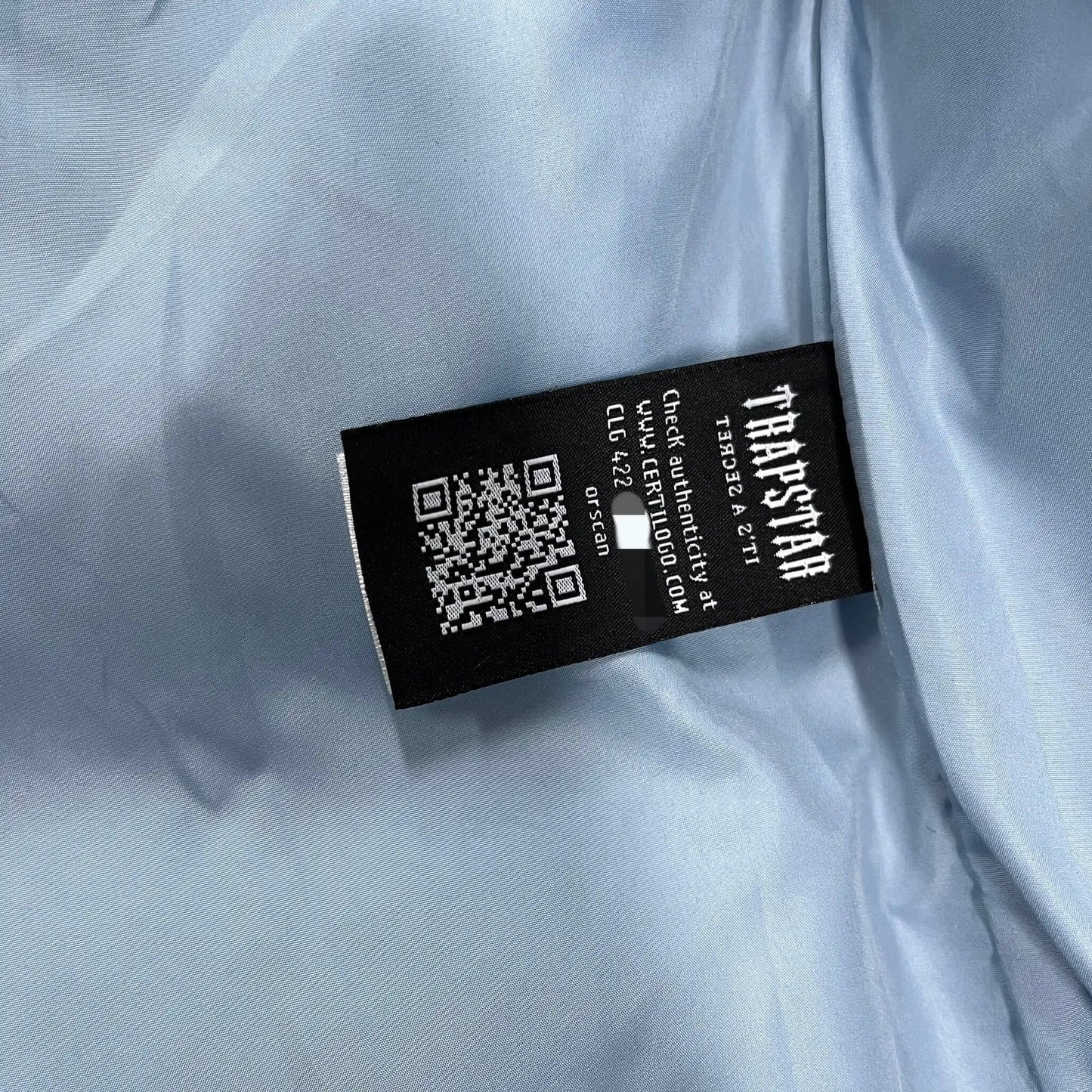 Veste bleue ciel secrète