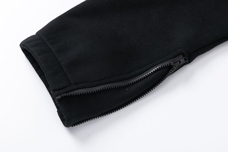 Pantalon noir et orange de tireur