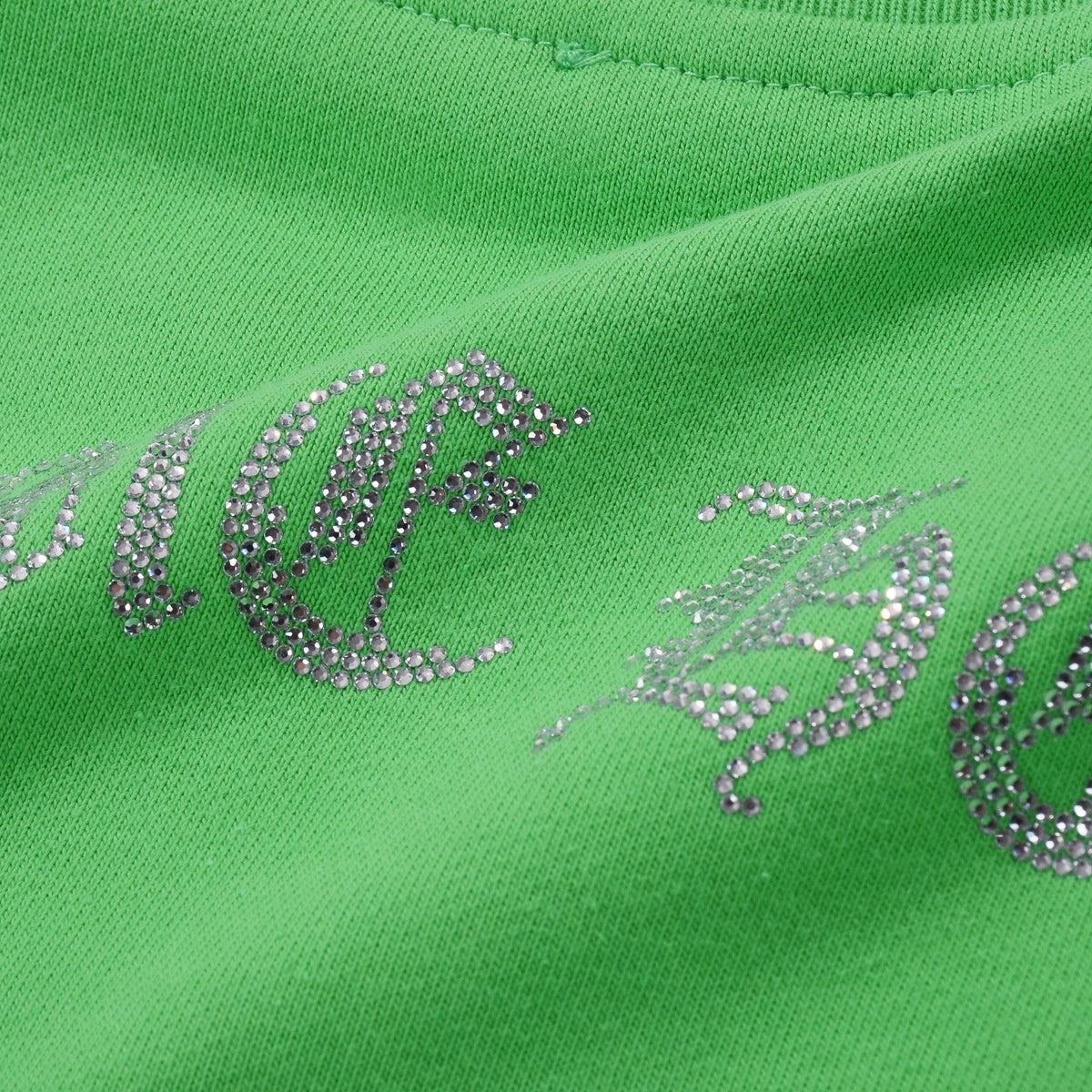 SWEAT-SHIRT VERT À CŒURS CHROMÉS ET CROIX BLANCHES