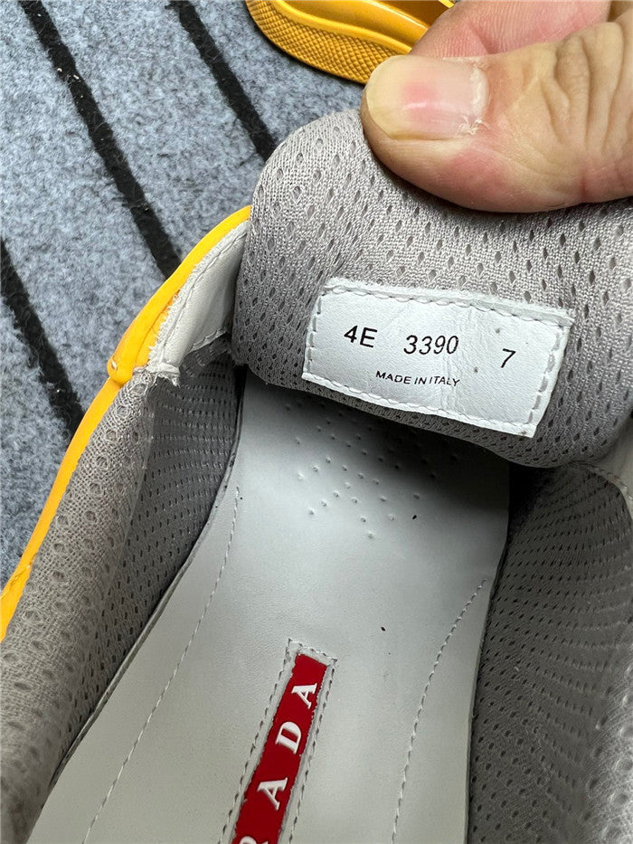 PRADA AMERICA'S CUP CAOUTCHOUC SOUPLE JAUNE ARGENT