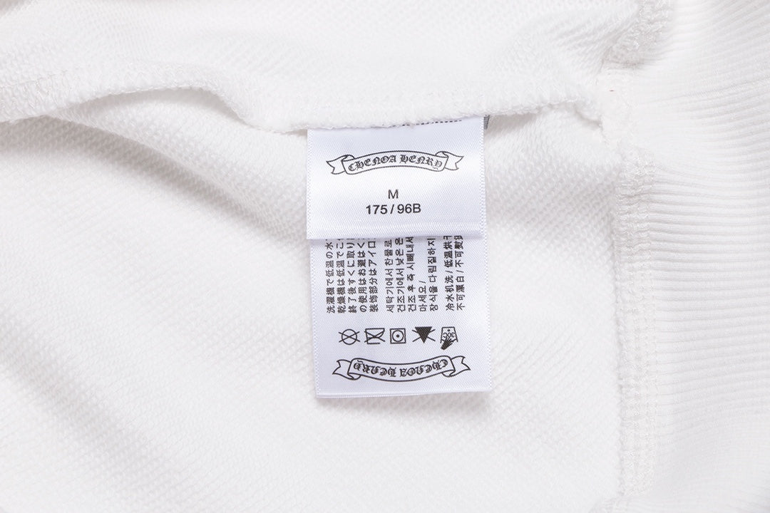 Sweat-shirt blanc avec logo fer à cheval et cœurs chromés