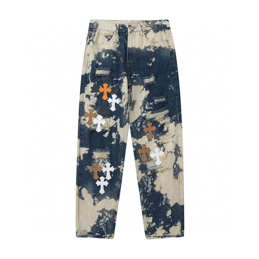 JEANS BLANC ORANGE À CŒURS CHROMÉS TIE-DYE ET ÉCUSSONS CROISÉS