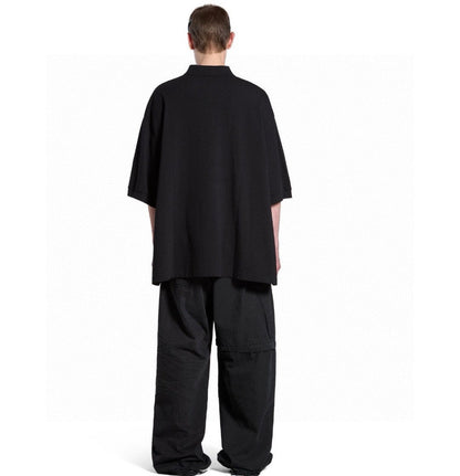 Polo noir Balenciaga à logo BB