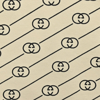 Polo Gucci beige et noir à motifs