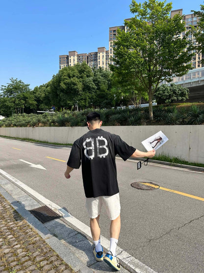 T-shirt Balenciaga à logo peint à la bombe (noir)