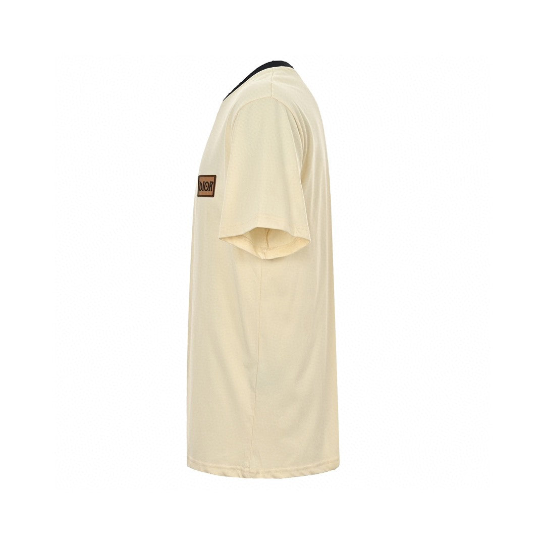 T-shirt crème Dior avec bordure noire