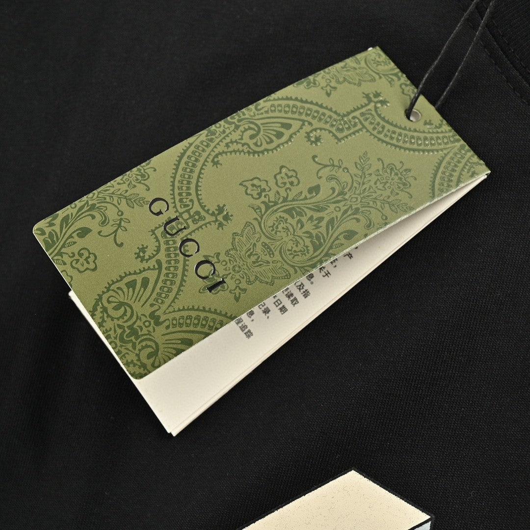T-shirt graphique Gucci 1921