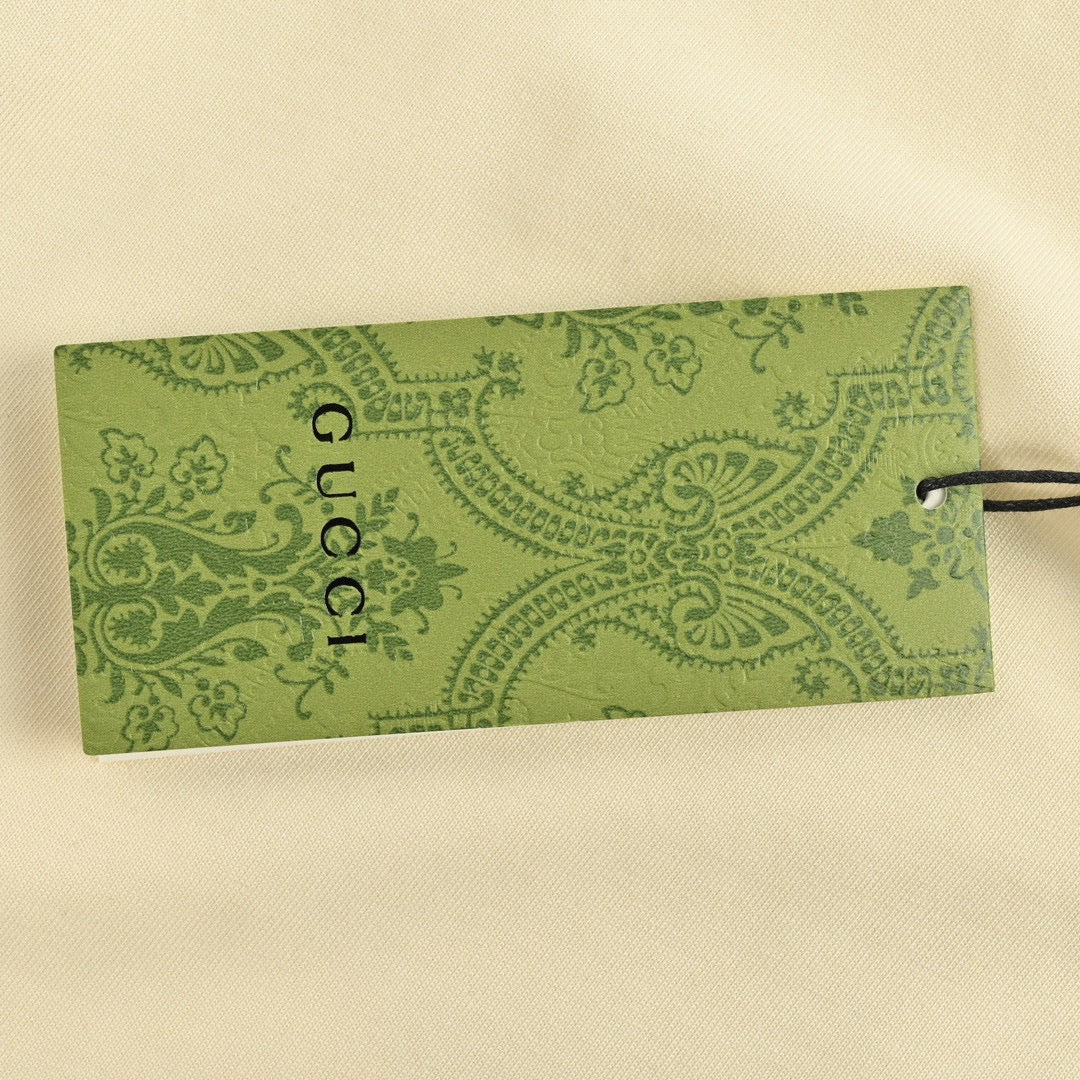 T-shirt Gucci avec logo vache de dessin animé (crème)