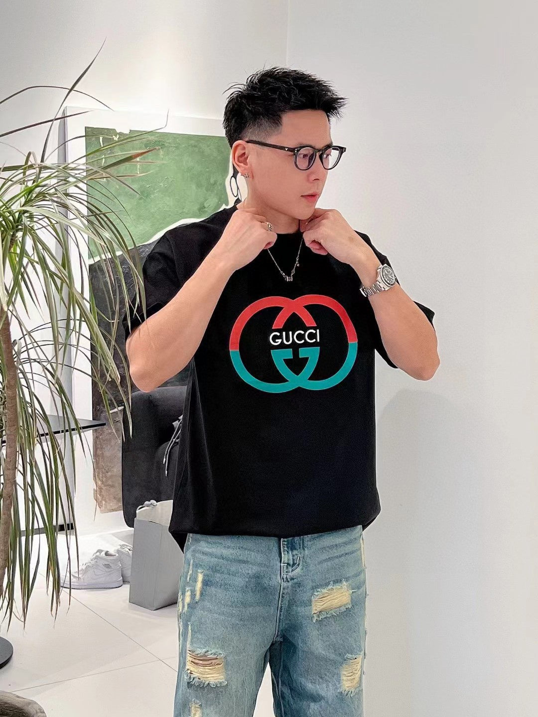 T-shirt noir Gucci à motif GG entrelacé