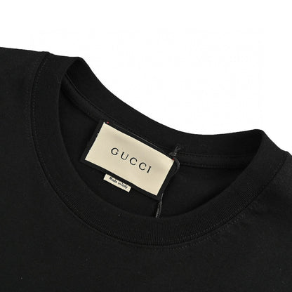 T-shirt noir Gucci à motif GG entrelacé