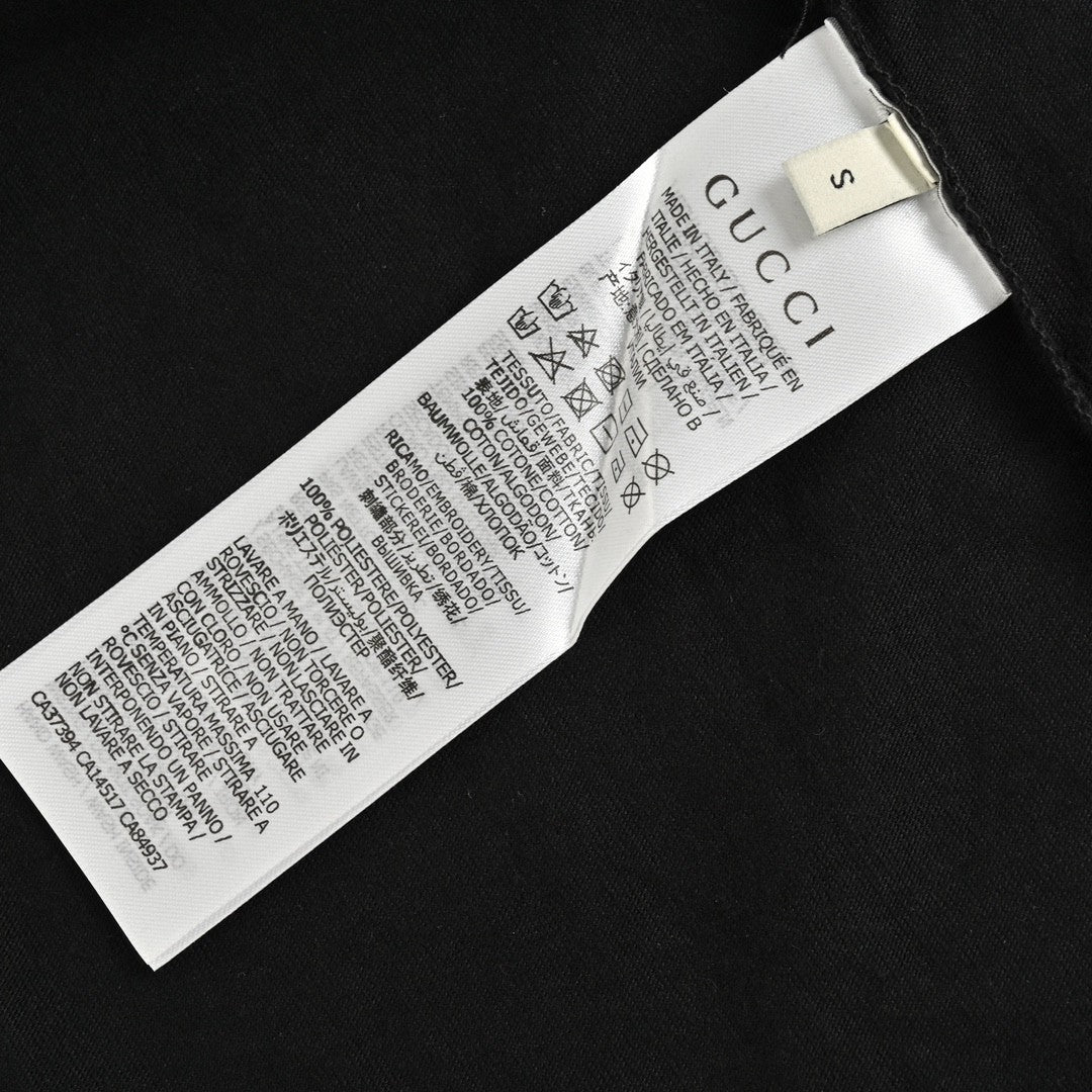 T-shirt noir Gucci à motif GG entrelacé