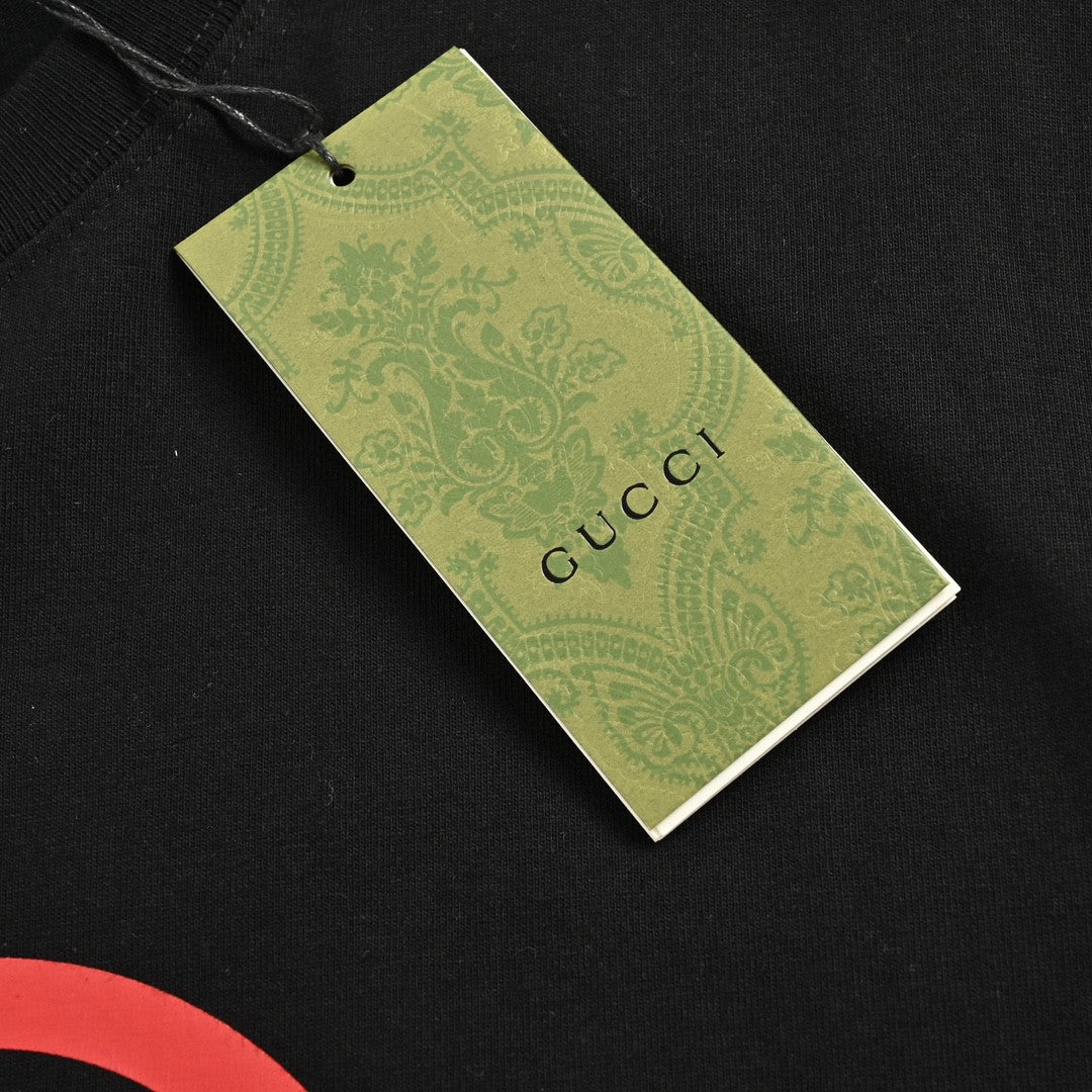T-shirt noir Gucci à motif GG entrelacé