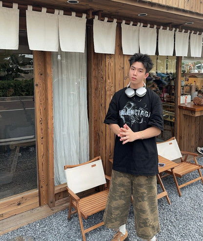 T-shirt Balenciaga à logo imprimé fumée (noir)