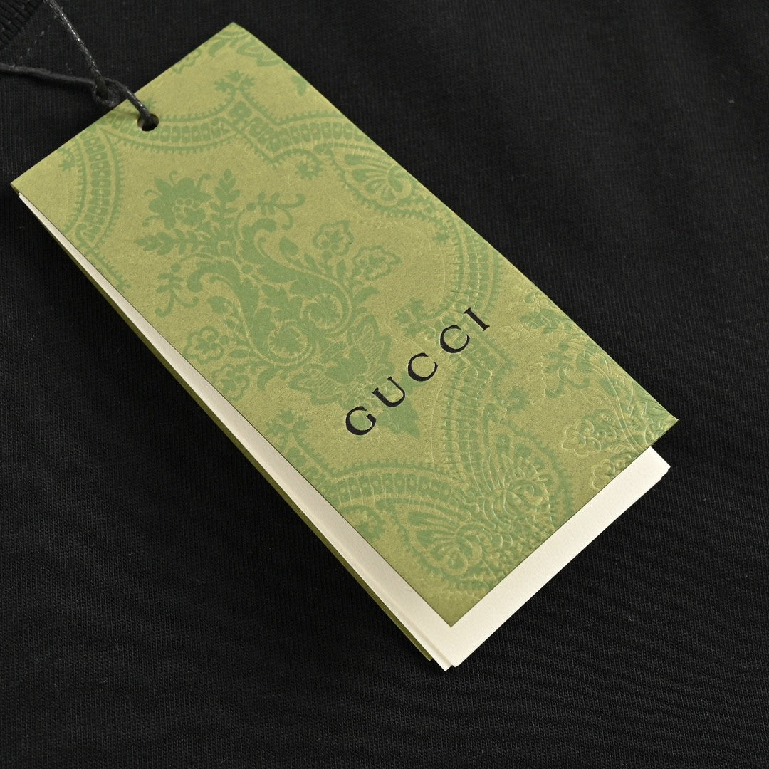 T-shirt noir Gucci à motif dinosaure