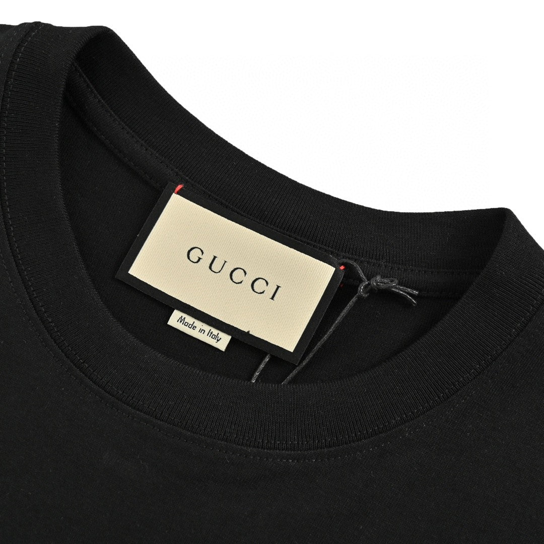 T-shirt noir Gucci à motif dinosaure