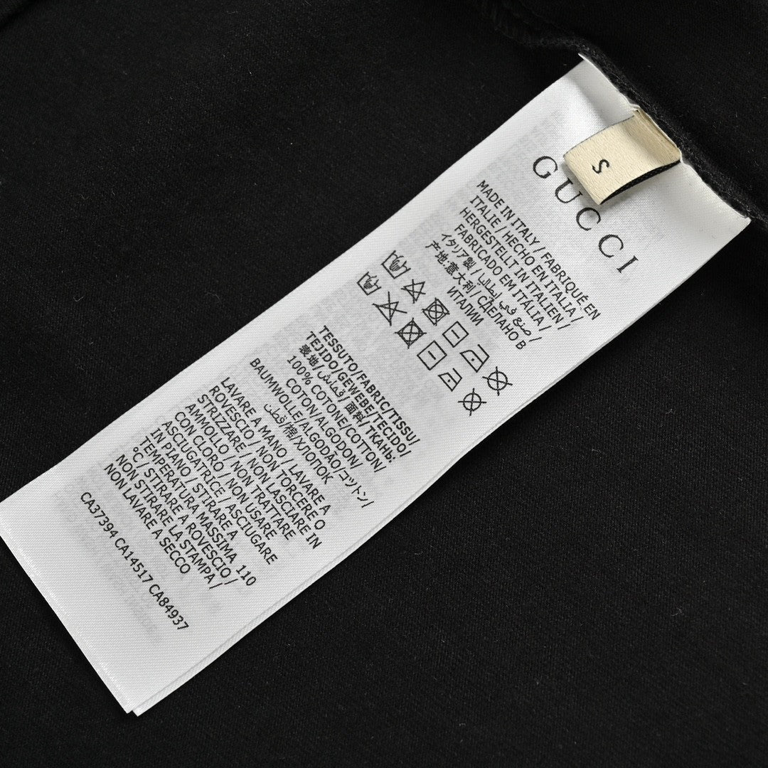 T-shirt noir Gucci à motif dinosaure rose