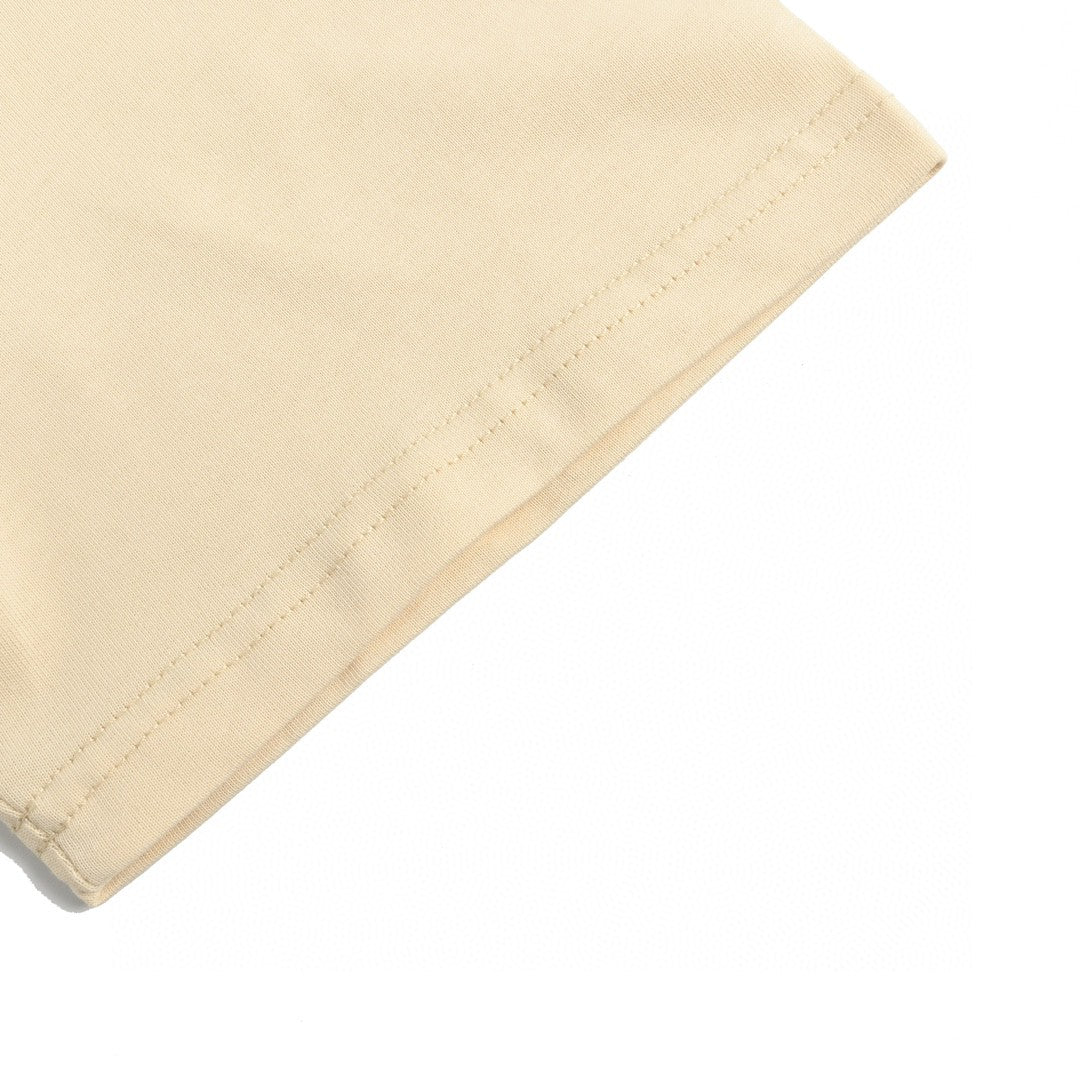 T-shirt Gucci à logo éclaboussé (beige)