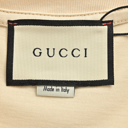T-shirt Gucci à logo éclaboussé (beige)