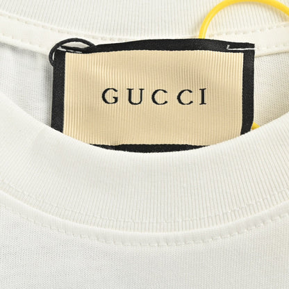 T-shirt blanc Gucci avec logo en écriture cursive