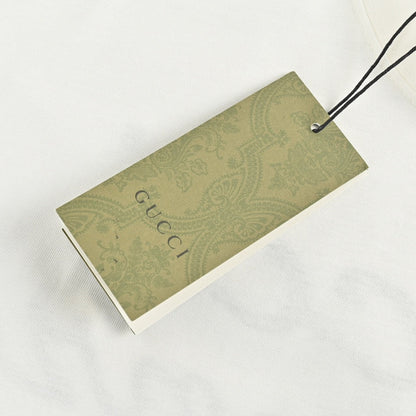 T-shirt blanc Gucci avec logo en écriture cursive