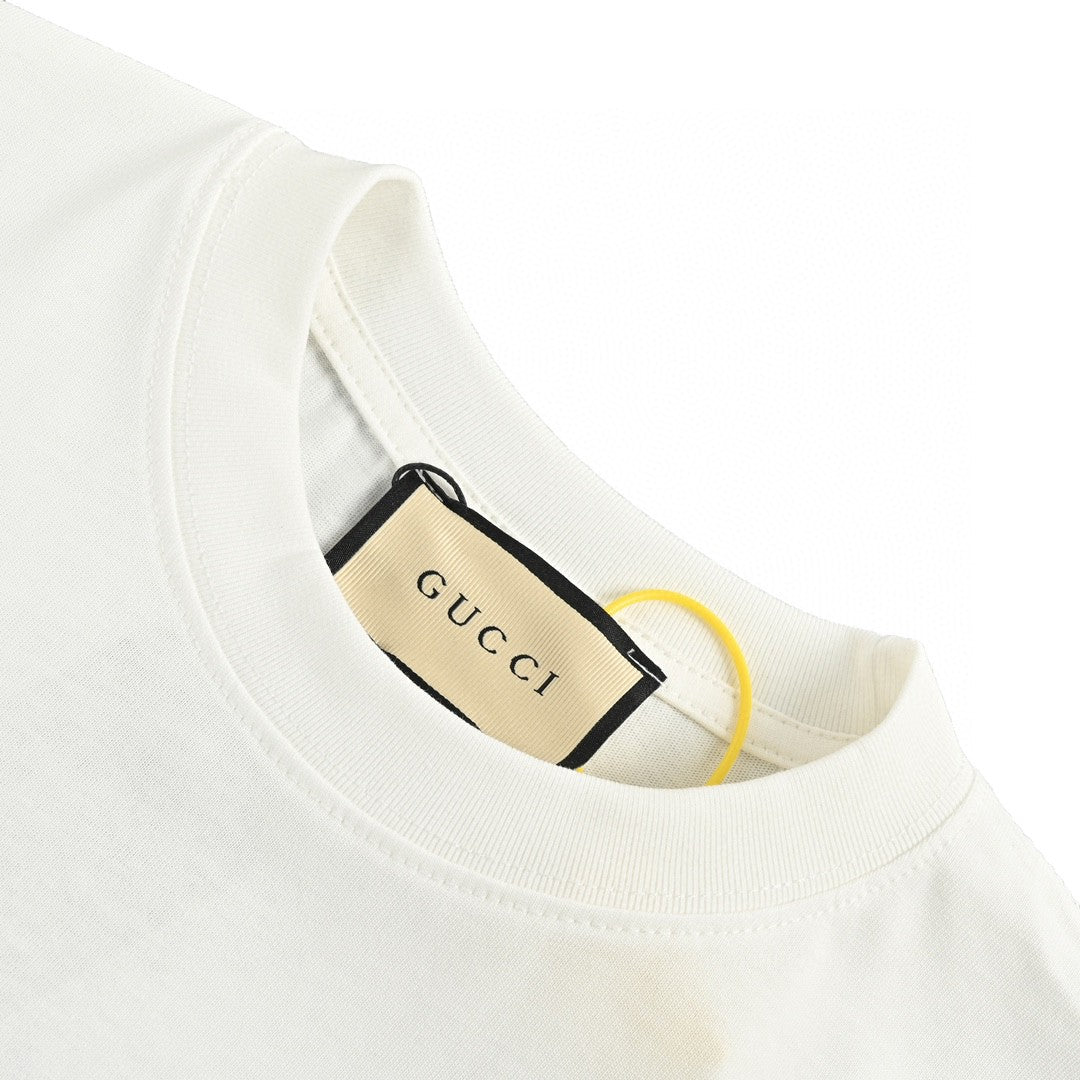 T-shirt blanc Gucci avec logo en écriture cursive