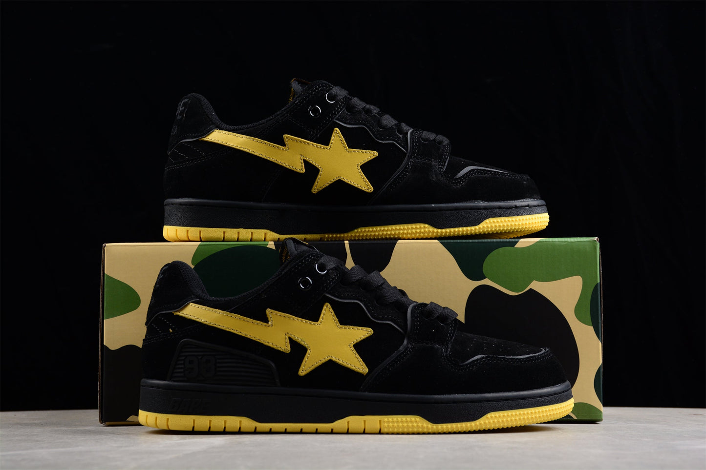 Baskets basses BAPE STA noires et jaunes
