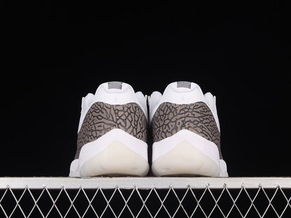 AIR JORDAN 11 RETRO LOW BLANC/BLEU UNIVERSITÉ