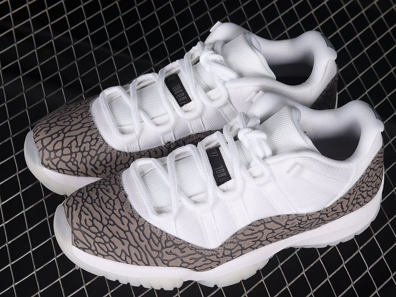 AIR JORDAN 11 RETRO LOW BLANC/BLEU UNIVERSITÉ