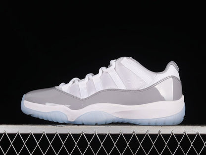 AIR JORDAN 11 RETRO LOW BLANC/BLEU UNIVERSITÉ