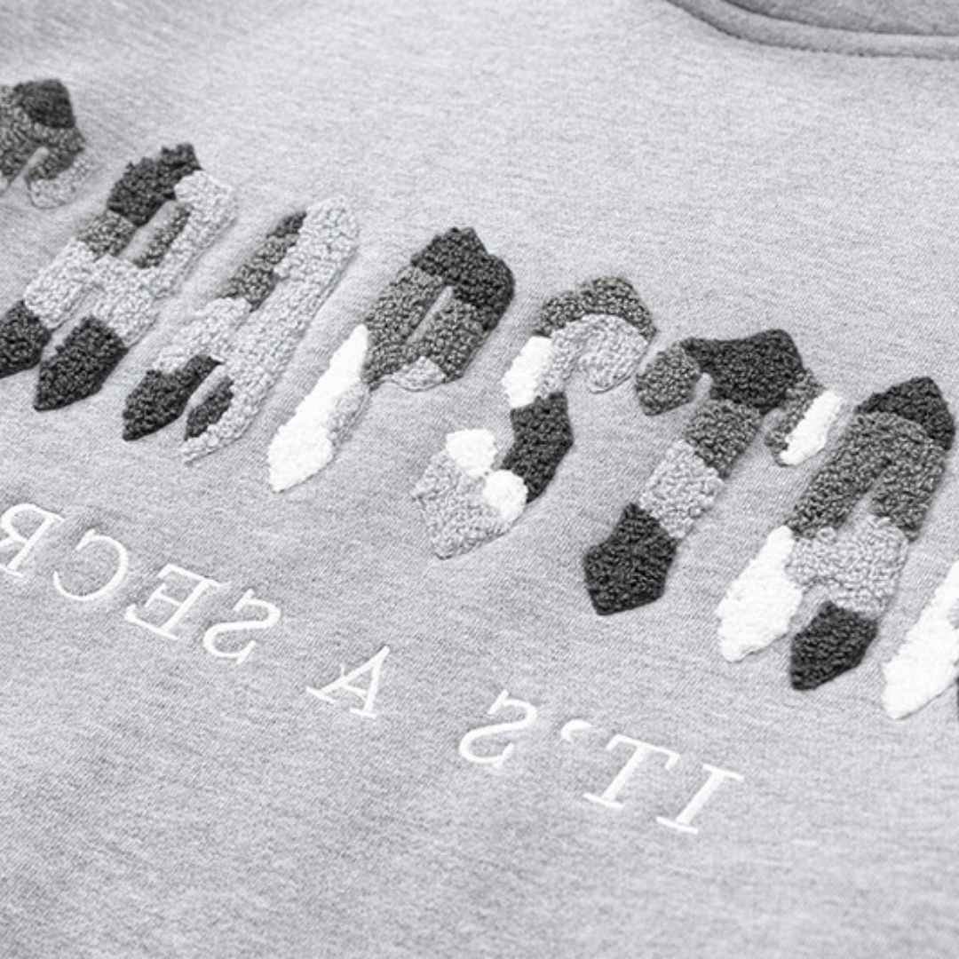 Survêtement gris décodé